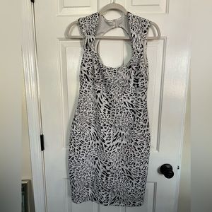 Cache white and black dress size large 2 buttons in the rear with zipper
